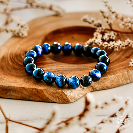 Blue Tiger's Eye bracelet with dark blue round bead gemstones and elastic stretch fit