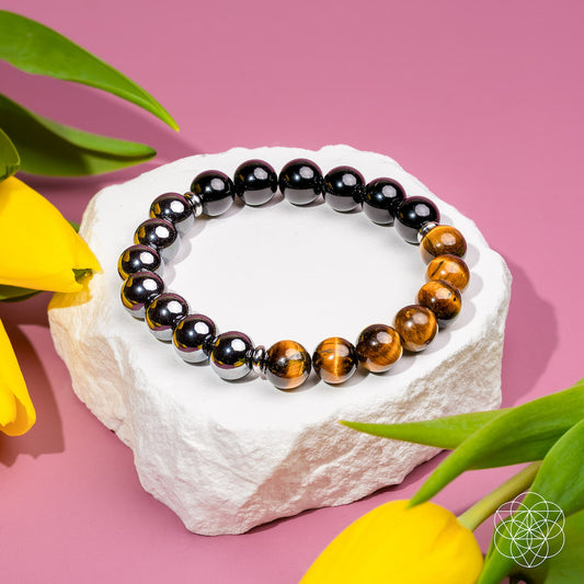 Beaded bracelet with black hematite-style beads and tiger-eye brown beads, round-shape
