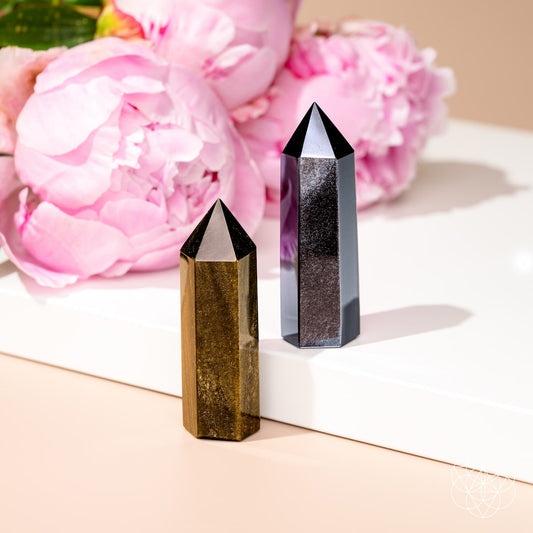 Obsidian point set: one gold-sheen and one silver-sheen crystal tower