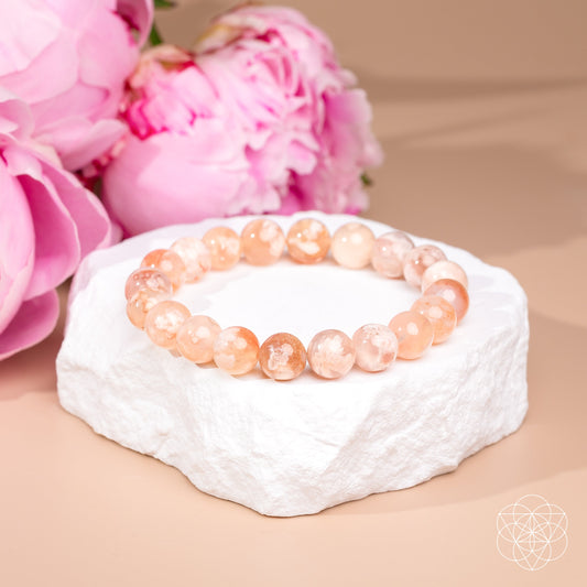 Peach and pink beaded agate bracelet with round stones, stretchy design