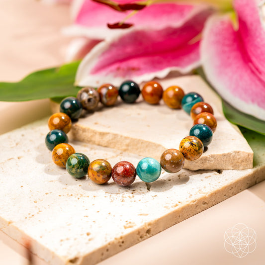Multicolor round bead bracelet with blue, orange, green, and brown stones