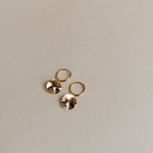 Pair of gold vermeil hoop earrings with hammered disc charms