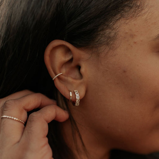 Jane Diamond Ear Cuff worn along the upper ear, with a fine row of stones