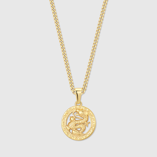 Gold dragon pendant charm with circular design on a link chain