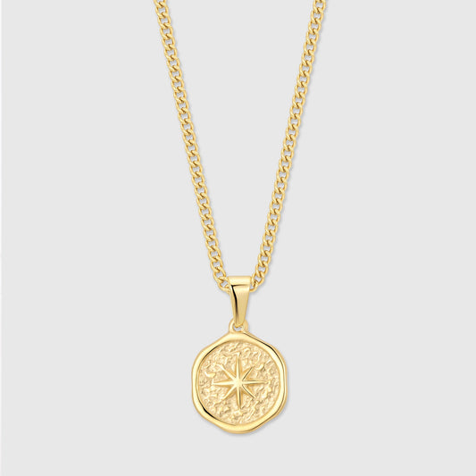 Gold compass pendant necklace with hammered round star design and chain