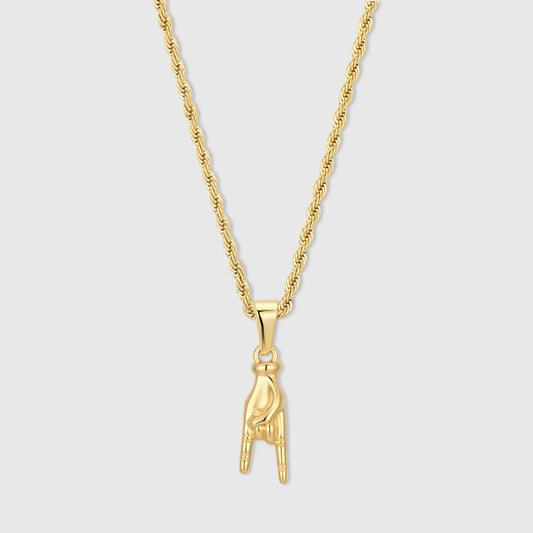 Gold hand-shaped pendant on a twisted chain necklace