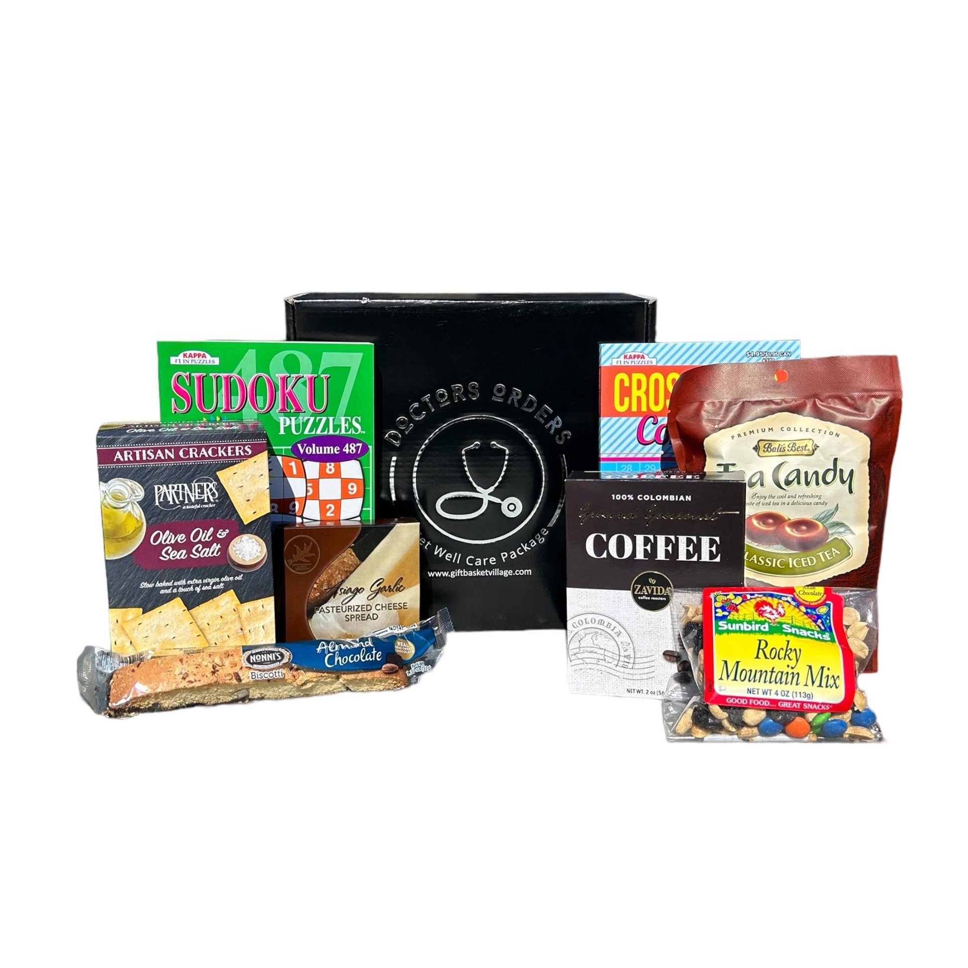 Care package gift box with puzzles, crackers, cheese spread, coffee and tea candy
