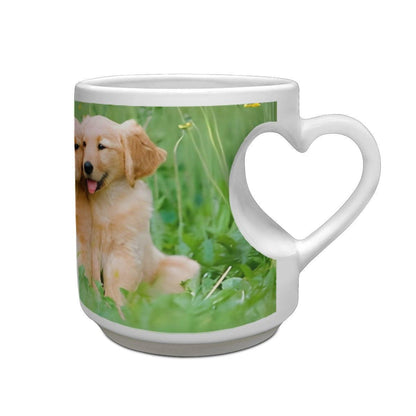 White ceramic mug with heart-shaped handle and custom photo print of a golden puppy
