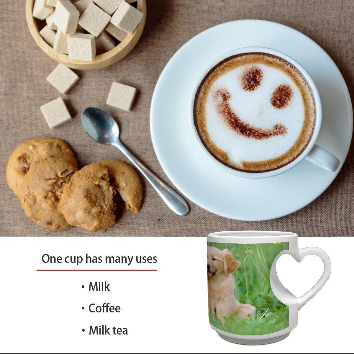 White ceramic mug with heart handle and golden puppy photo print on a coffee table