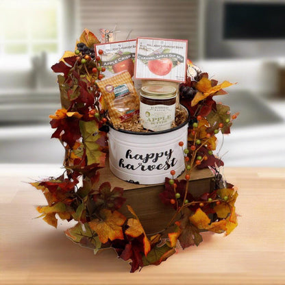 Happy harvest gift basket with fall wreath and enamel pail holding dip mixes and jam jars