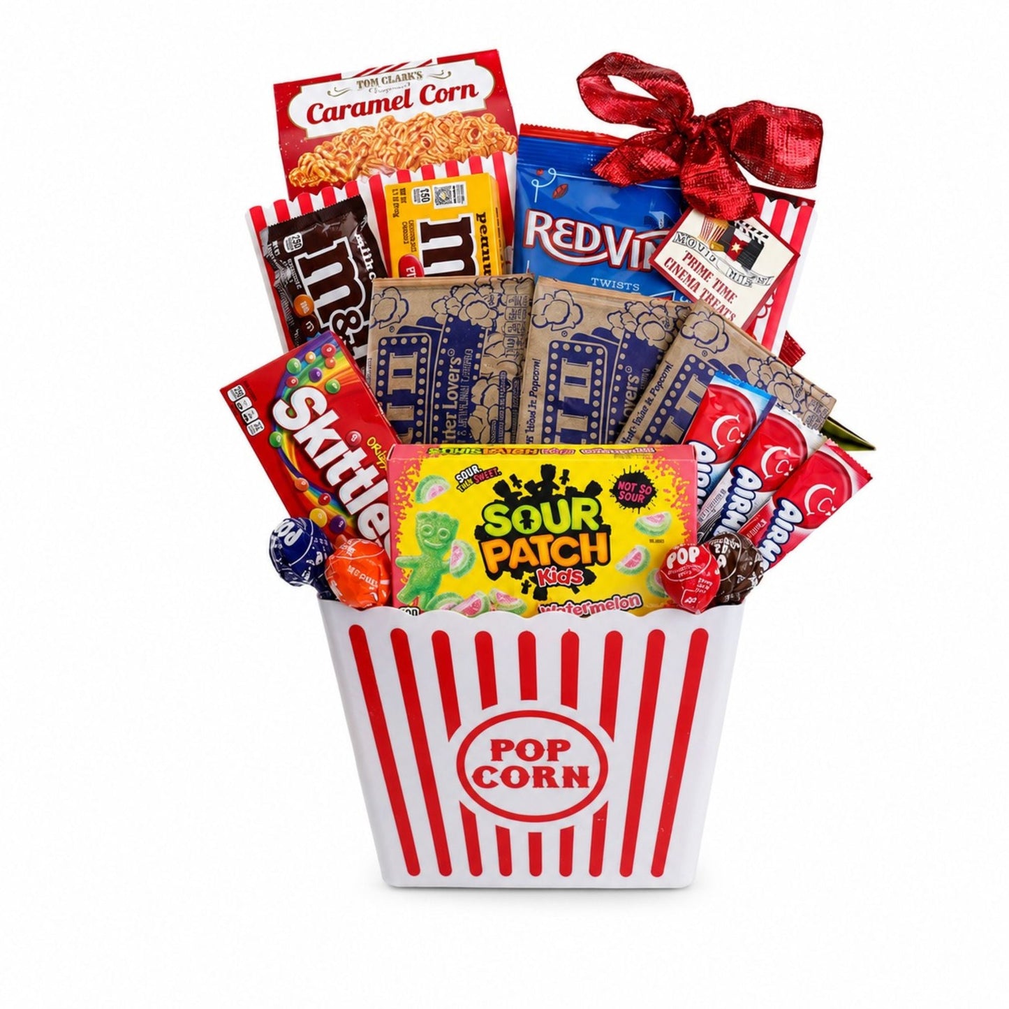 Movie night gift basket with red striped popcorn bucket and assorted candy bags