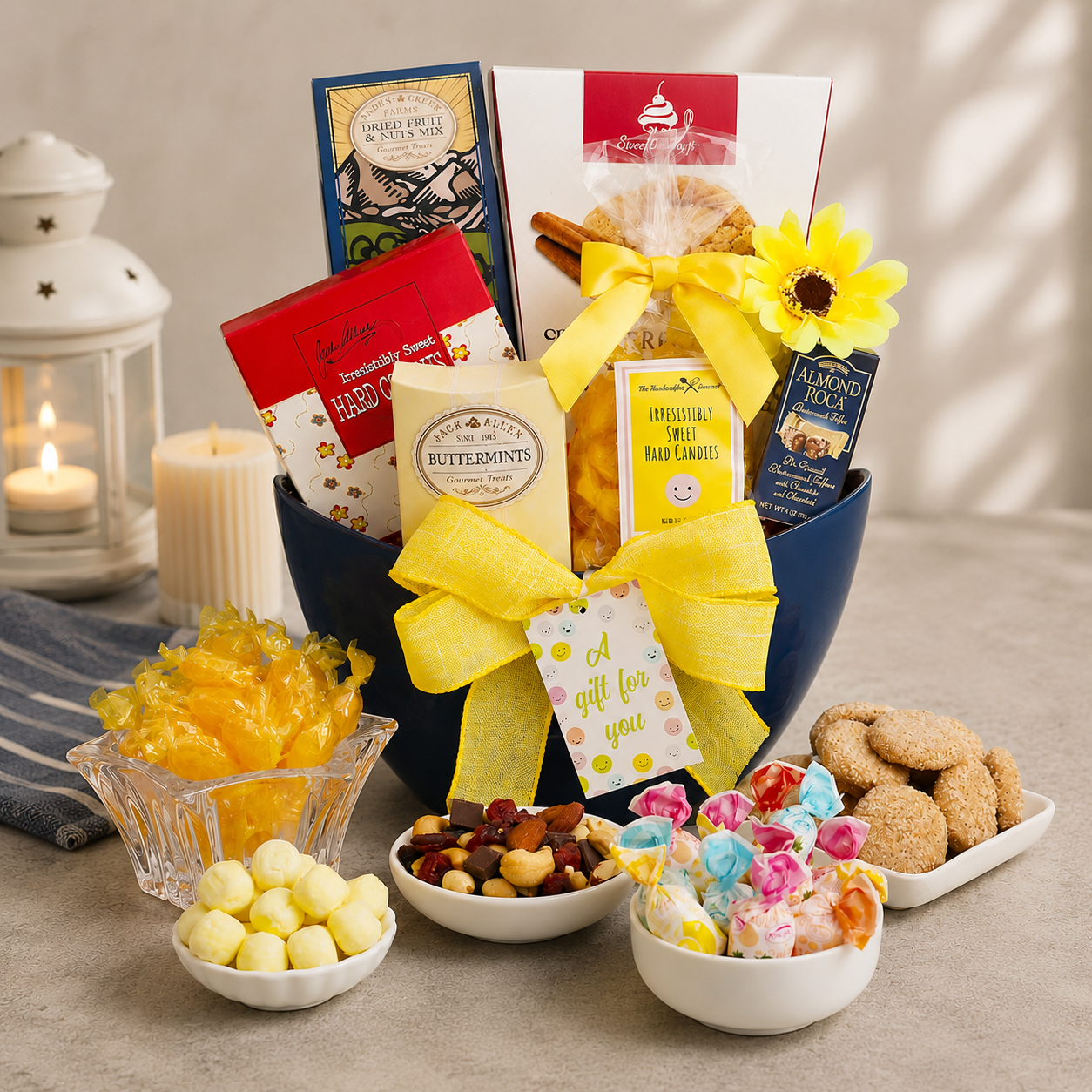 All Smiles gift basket with blue hamper, yellow bow, and assorted candy and snacks