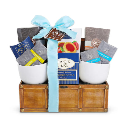 Coffee & tea gift basket with assorted cookie packets in white containers and wooden crate