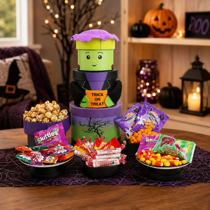 Halloween treat tower with Frankenstein-style character and wrapped candies