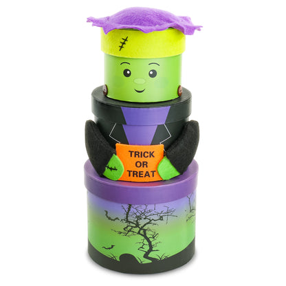 Tall Halloween treat tower with green monster head, trick-or-treat box