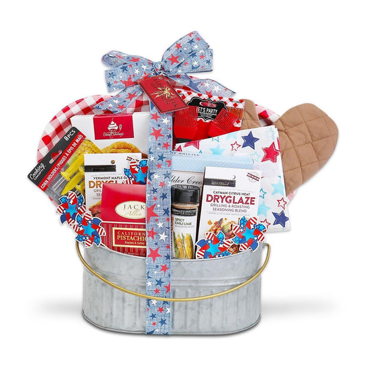 BBQ gift basket with red, white, and blue bow and brown grill mitt beside spice packs