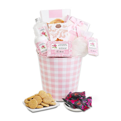 Pink gingham gift basket with rose bath soap, truffles, and wrapped rose candies