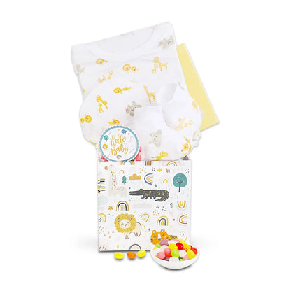 Baby gift box with white jungle onesie, “Hello Baby” tag, multicolor candy balls