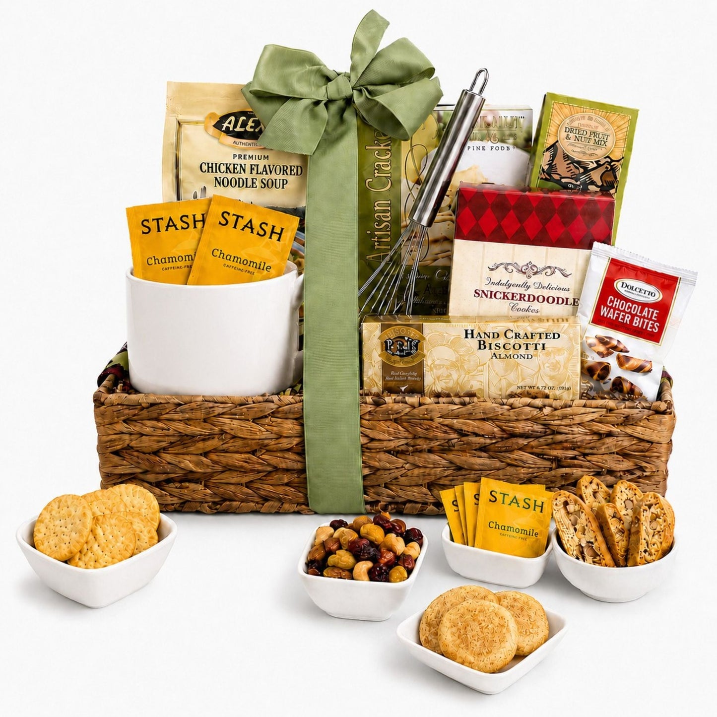 Gift basket with woven tray and green bow, soup packets, biscotti and snack pouches, cookie cups