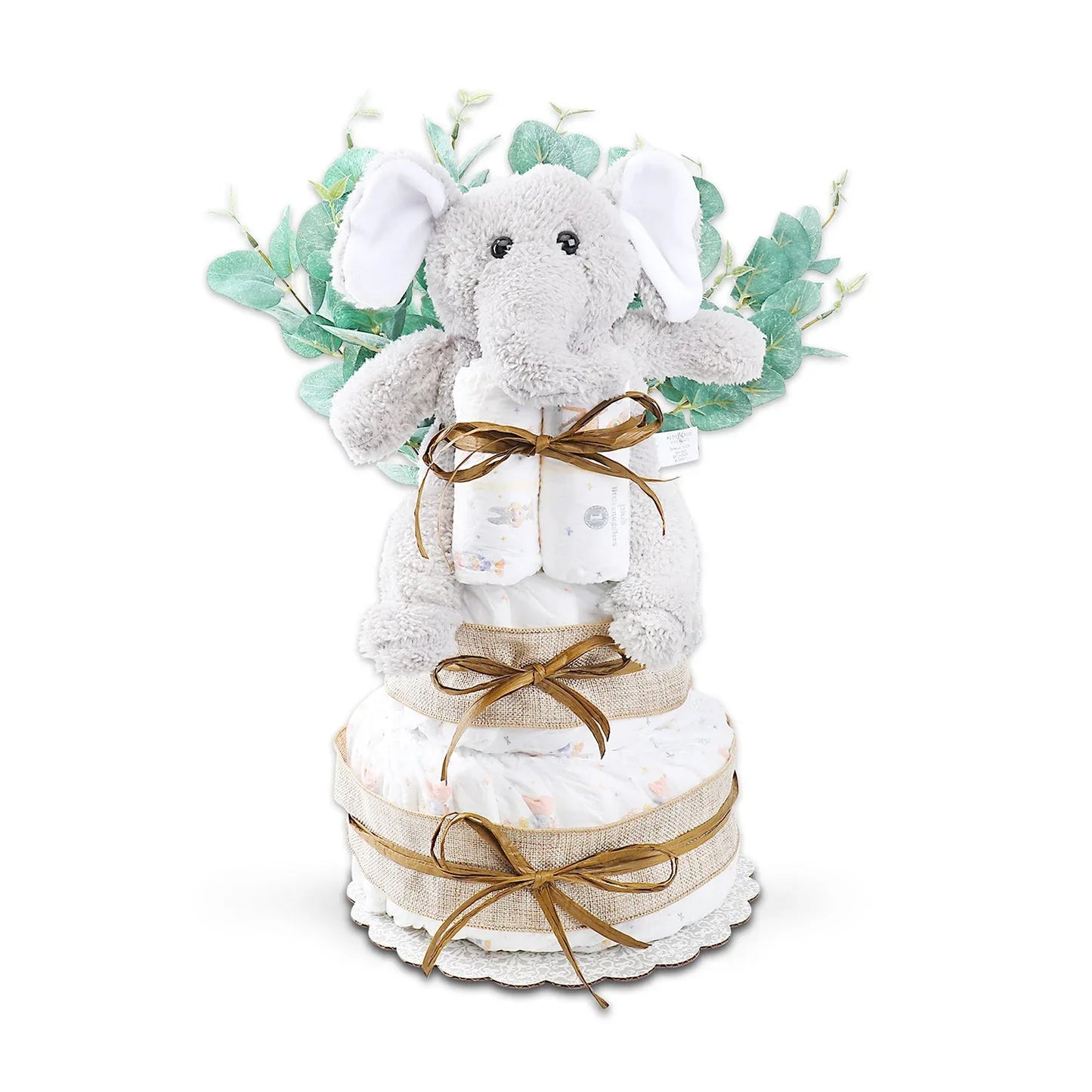 Two-tier diaper cake gift with plush elephant topper, mint-green leaves, ribboned diapers
