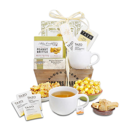 Mother's Day serenity tea crate with white mug, TAZO tea packets, and biscuits