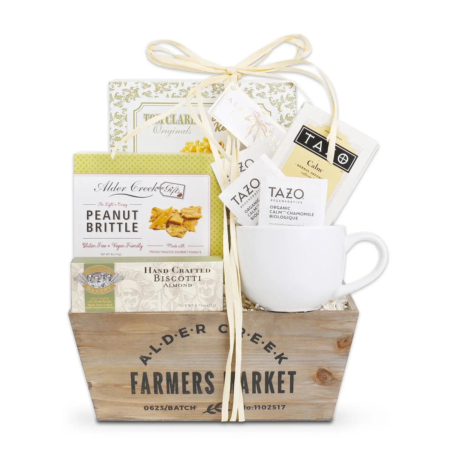 Tea gift crate with white mug, TAZO Calm chamomile packets, peanut brittle & almonds
