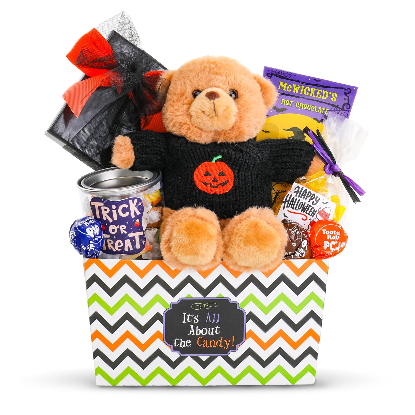 Halloween gift basket with plush teddy, jack-o'-lantern patch, and assorted Halloween candy