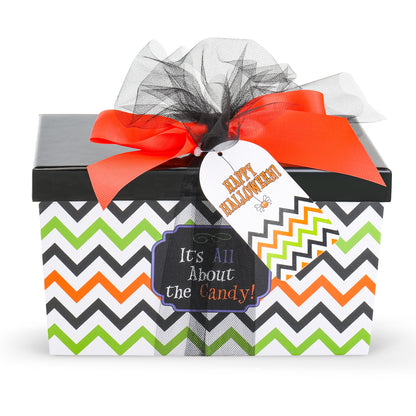 Halloween gift basket tied with orange and black ribbons, with Happy Halloween tag