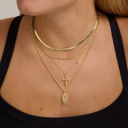 Gold rope-chain necklace with oval Virgin Mary medallion pendant