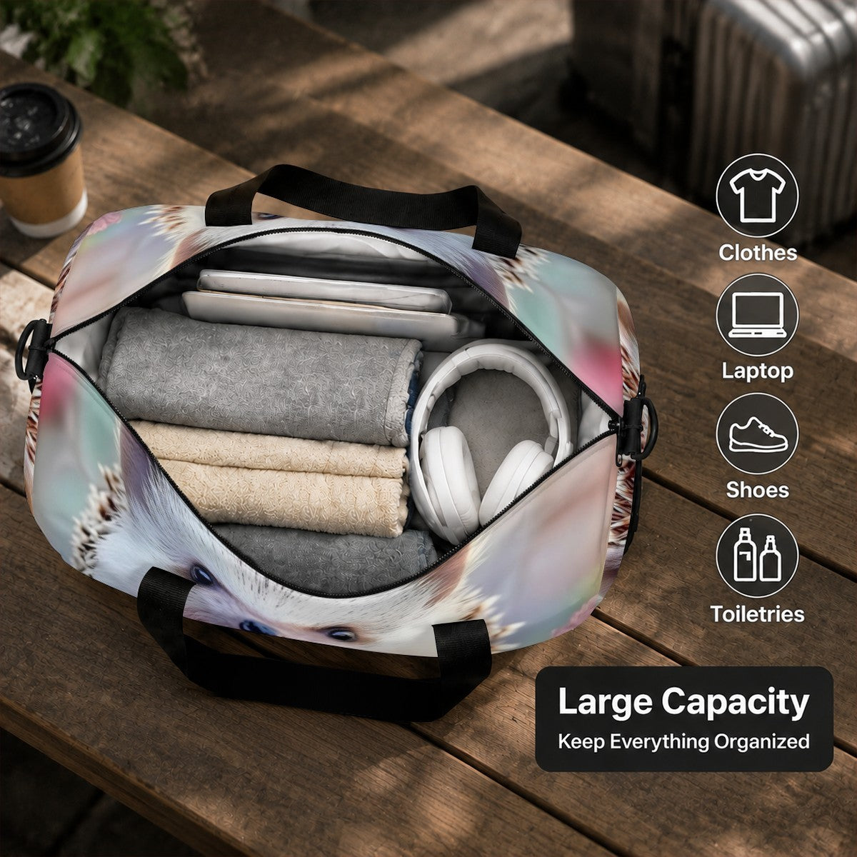 Hedgehog print duffel bag open with roomy interior holding folded clothes