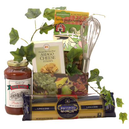 Italian gourmet gift basket with pasta, cheese straws, sauce jars, and grape leaves