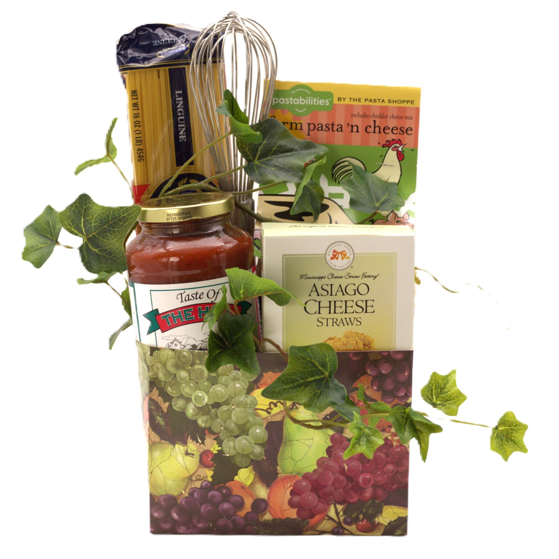 Italian gourmet gift basket with pasta, cheese straws, sauce jar, and grape leaves