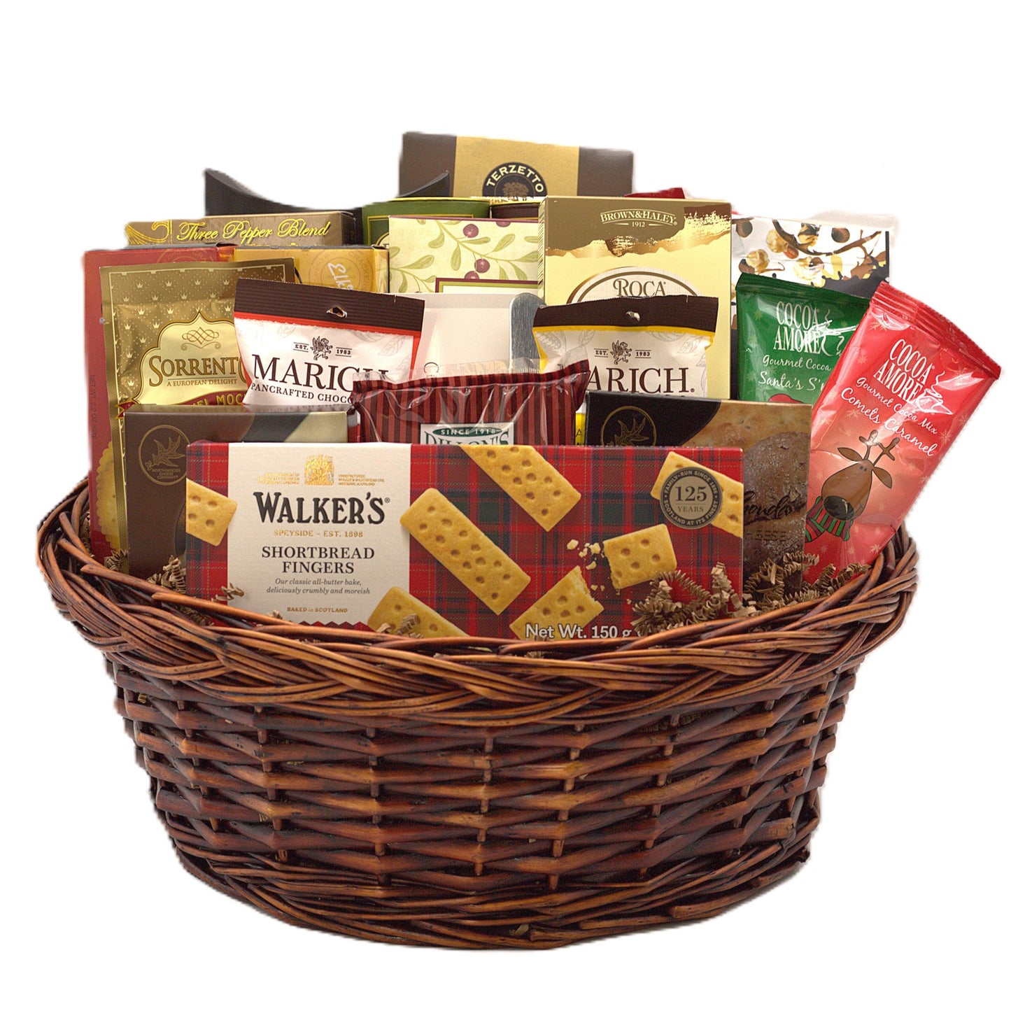 Wicker gift basket filled with assorted chocolate and shortbread cookies and candy bags
