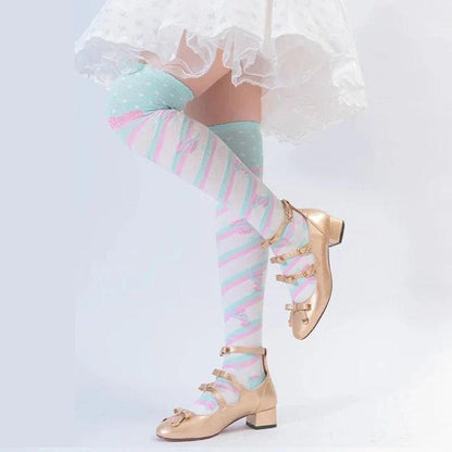 Knee-high socks with pastel rainbow stripes and light heart print