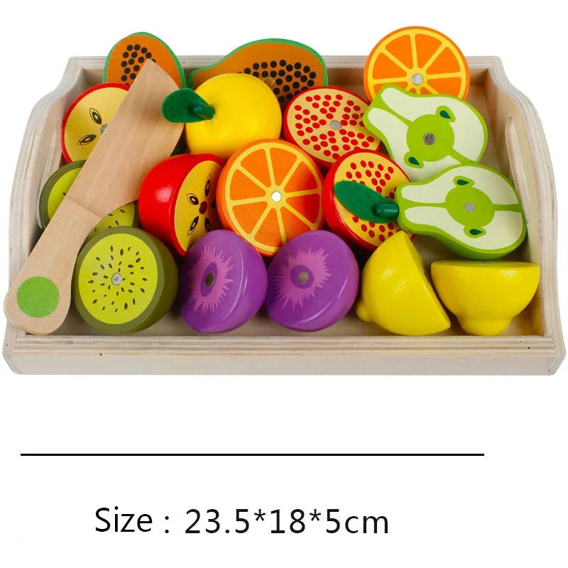 Wooden pretend fruit and veggie cutting toy in open wooden tray with colorful pieces