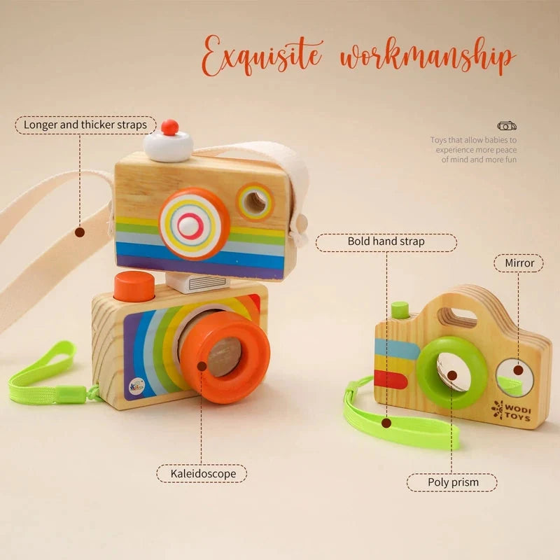 Wooden camera pendant toy with colorful circular lens details and chunky hand strap