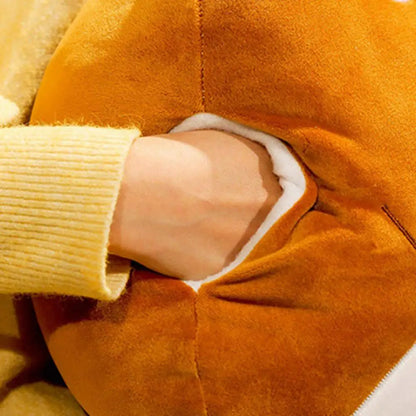Orange plush cushion blanket corner with knit cuff and curved white trim