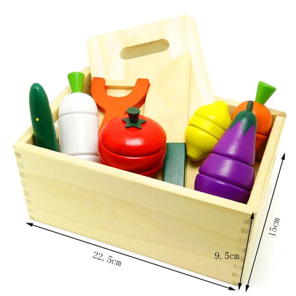 Wooden pretend cutting set stored in a wooden crate with assorted fruit and veg pieces