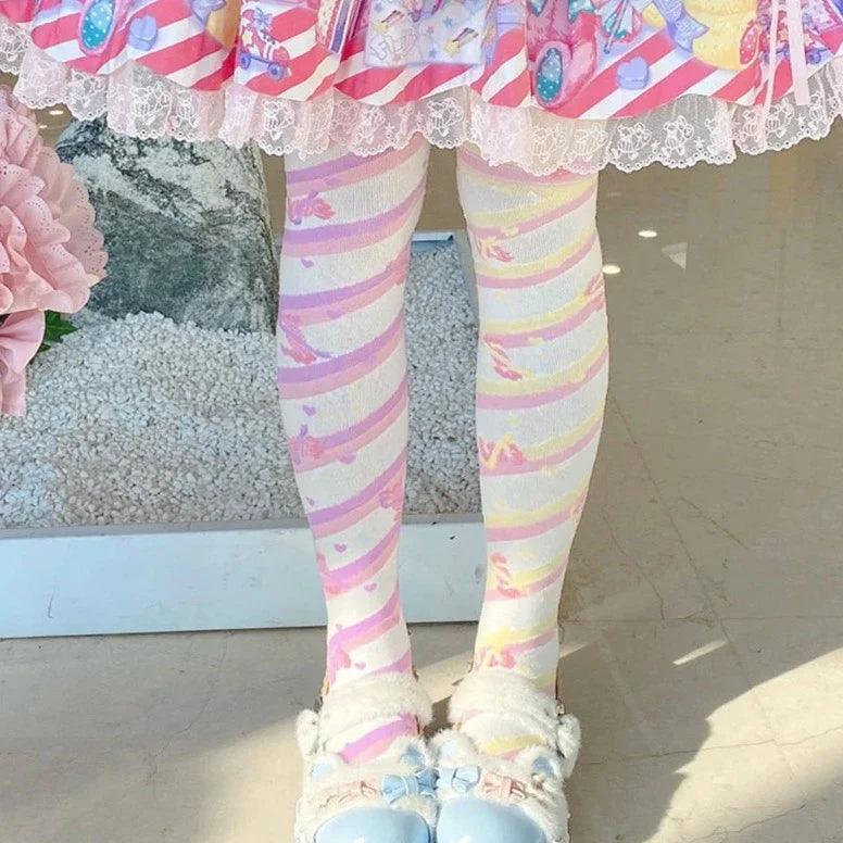 Knee-high socks with pastel rainbow stripes and small heart print