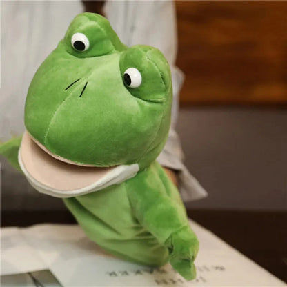Green frog finger puppet plush with white belly and big round eyes