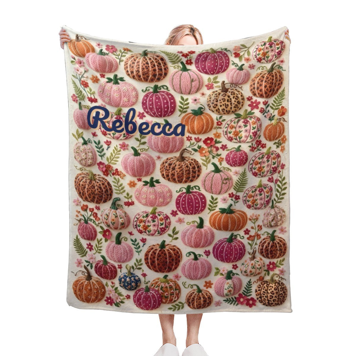 Personalized fleece throw blanket with pumpkin-floral pattern and name Rebecca on light base