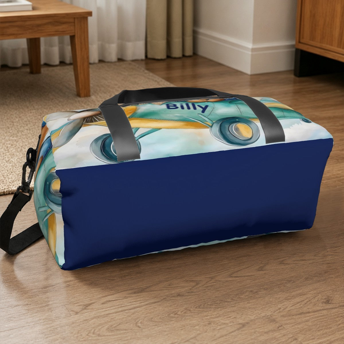 Blue teddy bear duffel bag with black webbing straps and rectangular base.