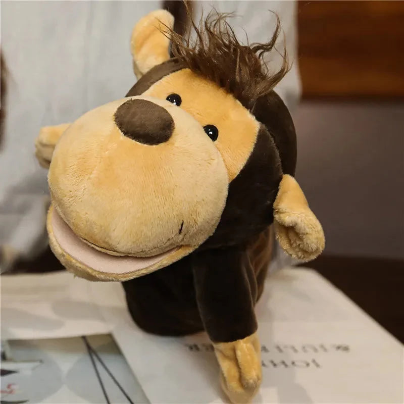 Tan lion finger puppet plush with brown mane and stitched black nose