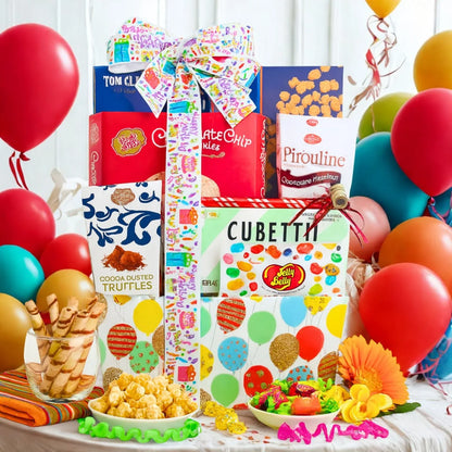 Birthday gift tote with confetti-style ribbon, assorted snacks and truffles