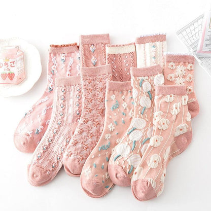 Floral embroidered socks set with pink, white, and textured lace-like stitching details