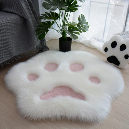 White faux fur cat paw area rug with soft pink paw pad details