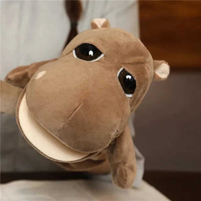 Brown plush finger puppet animal with big snout and black eyes
