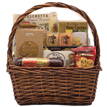 Wicker gift basket with cinnamon coffee bag, crackers, and chocolate cookies