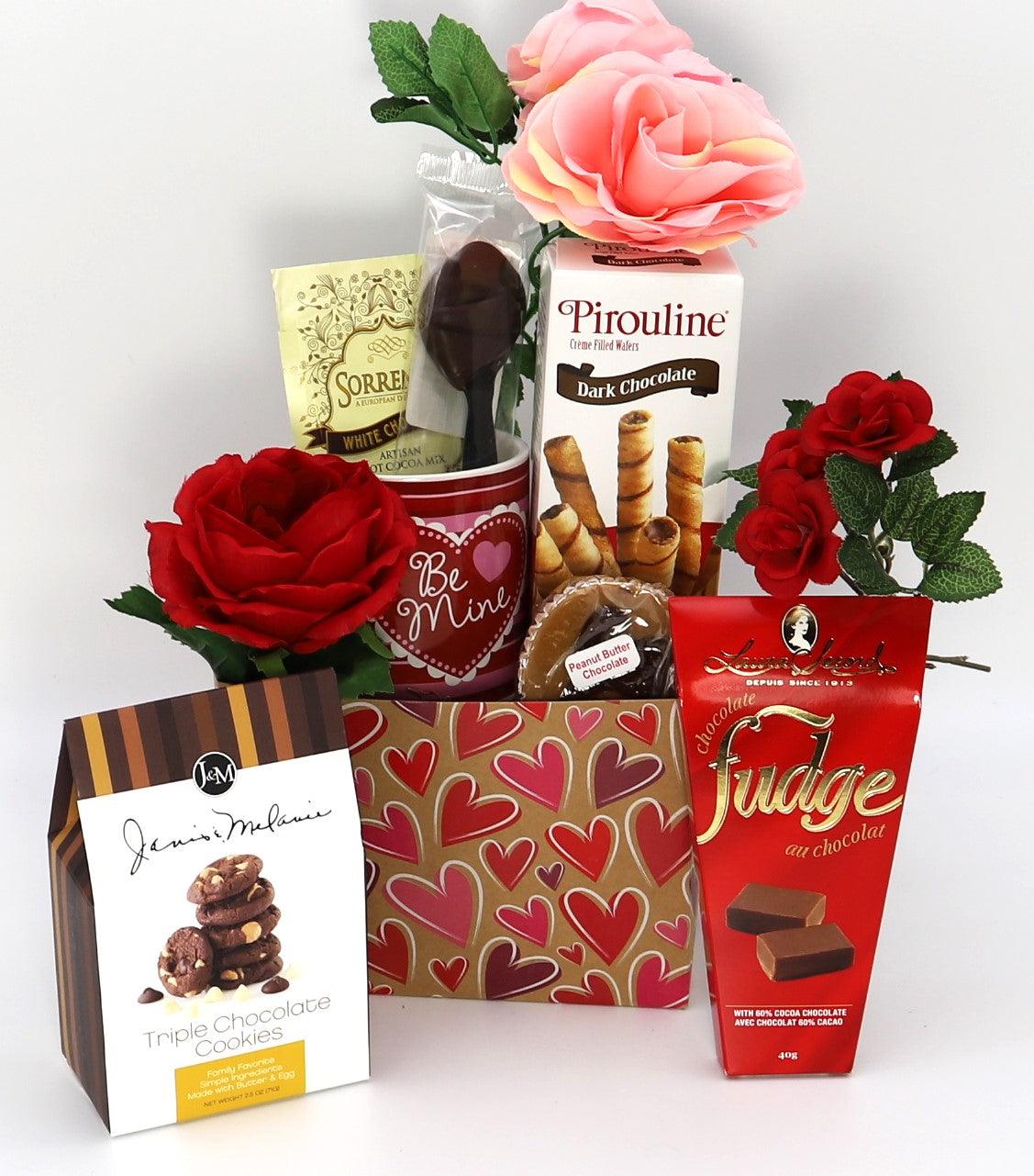 Valentine gift box with red heart pattern, roses, and assorted chocolates and cookies