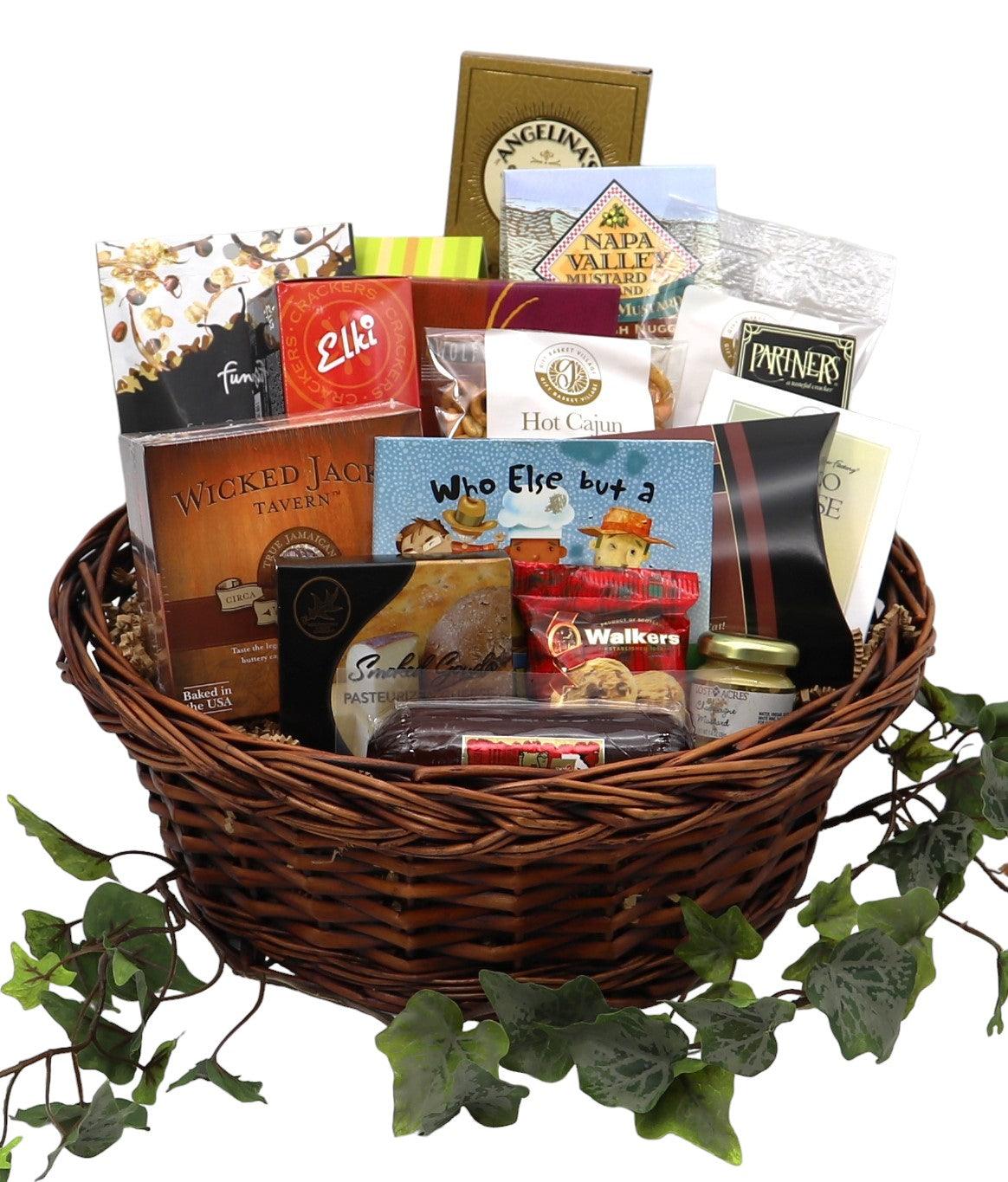 Wicker gift basket packed with assorted gourmet snacks, bags, and tins